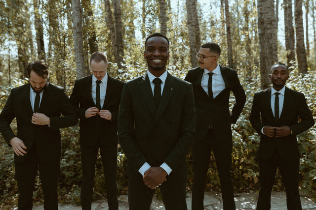 A Mr. Derk wedding party in black suits, fitted and coordinated in our Edmonton shop