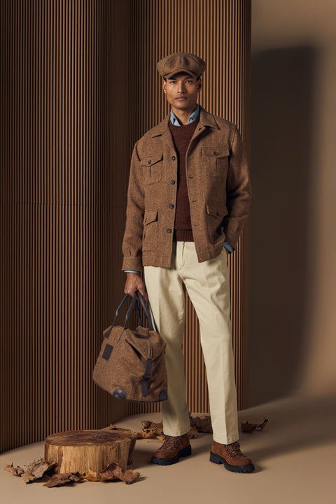 Gran Sasso knitwear layered under a herringbone tweed overshirt, AW26