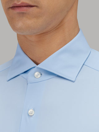 Blue Xacus 11460 Active dress shirt back view showing curved hem