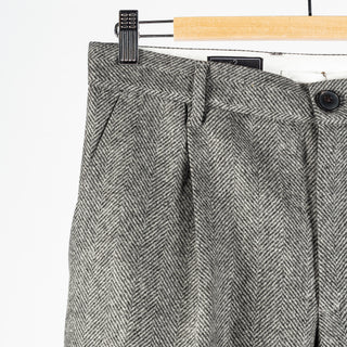 Portuguese Flannel Grey Single Pleat Herringbone Trousers — on-model styling