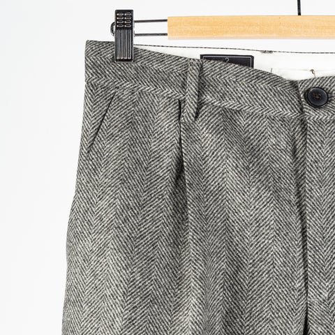 Portuguese Flannel Grey Single Pleat Herringbone Trousers — on-model styling