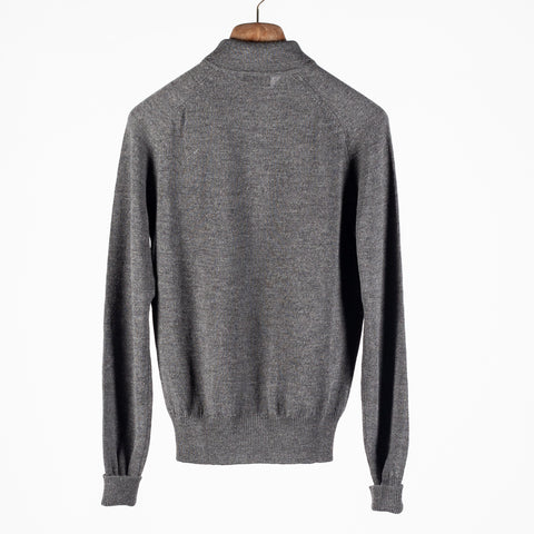 Drake's grey long sleeve merino knit polo from the back, showing the shoulder line and ribbed hem.