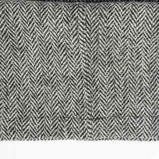 Close detail of the grey herringbone Harris Tweed used for Drake's One Pleat Games Trousers.
