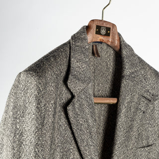 Drake's Black and White Tweed Western Games Blazer, lapel roll and soft natural shoulder on the hanger.