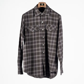 Drake's Grey Long Point Two Pocket Check Shirt shown front on and buttoned on a wooden hanger.