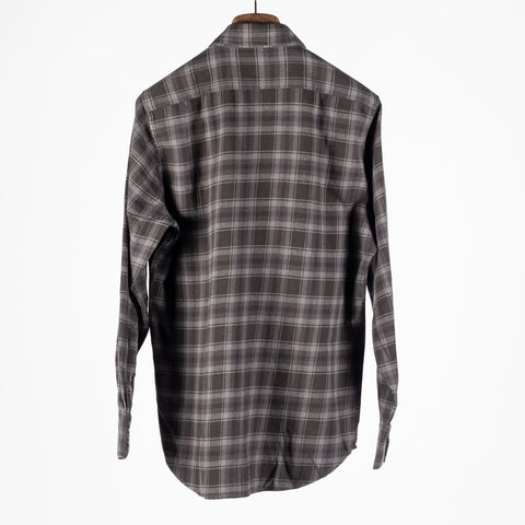 Drake's Grey Long Point Two Pocket Check Shirt seen from the back on the hanger.