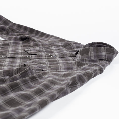 Drake's Grey Long Point Two Pocket Check Shirt laid down, showing the placket and chest pocket.