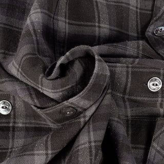 Close detail of the grey cotton and silk check cloth on Drake's Long Point Two Pocket Shirt.