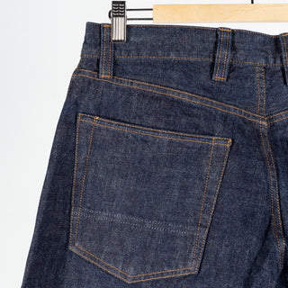 Drake's Indigo Rinse Selvedge Jeans, back patch pocket and belt loops in close view.