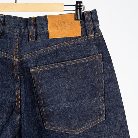 Drake's Indigo Rinse Selvedge Jeans, leather waistband patch above the back pocket.