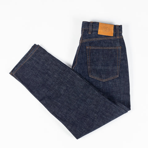 Drake's Indigo Rinse Selvedge Jeans laid folded, showing the straight tapered leg.