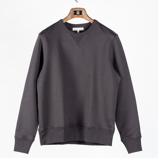 Merz b. Schwanen Charcoal 3M46 mid-century fleece sweatshirt, front view on a hanger