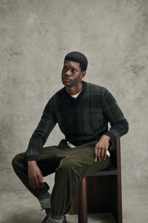 Barbour Black Tartan Hunham Knit styled in the Barbour autumn winter 2026 campaign.