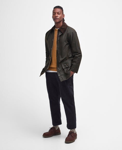 Barbour Olive Classic Beaufort Wax Jacket worn by a model, full length view.