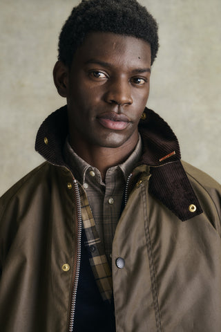 Barbour Navy Florcombe Knit Cardigan styled in the Barbour autumn winter 2026 campaign.