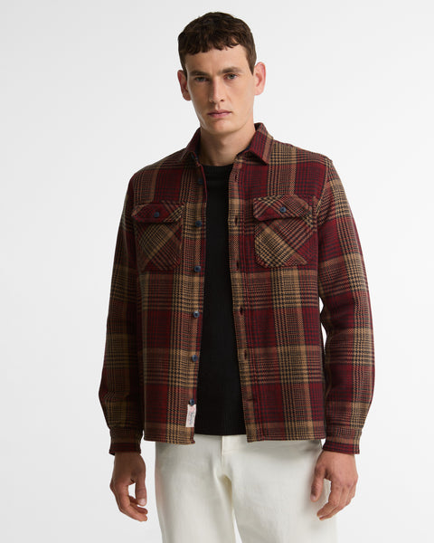 Barbour Red Check Millom Shirt worn by a model.