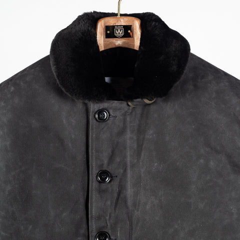 Black/Black waxed canvas N-1 Deck Jacket with black mouton collar, black mouton collar
