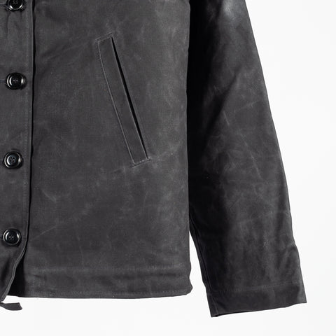 Black/Black waxed canvas N-1 Deck Jacket with black mouton collar, welt pocket and sleeve
