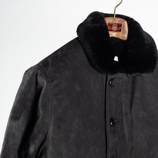 Black/Black waxed canvas N-1 Deck Jacket with black mouton collar, collar and shoulder