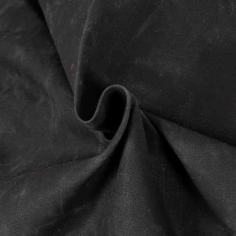 Black/Black waxed canvas N-1 Deck Jacket with black mouton collar, waxed canvas close-up
