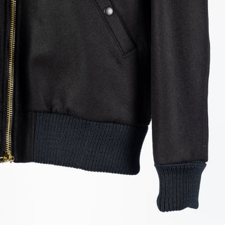 Black melton wool Flyer's Club Jacket with black mouton collar, ribbed hem, cuff and snap pocket