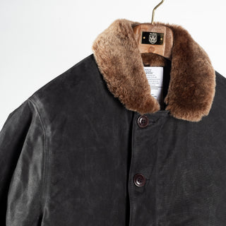 Black/Kodiak waxed canvas N-1 Deck Jacket with brown Kodiak mouton collar, collar and shoulder