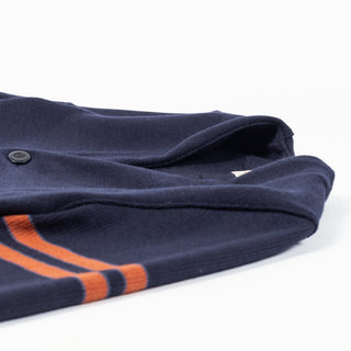 Dark navy wool Slouchy Varsity Cardigan with burnt orange sleeve stripes, burnt orange sleeve stripes