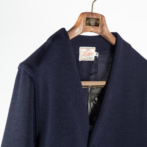 Dark navy wool Slouchy Varsity Cardigan with burnt orange sleeve stripes, neckline detail
