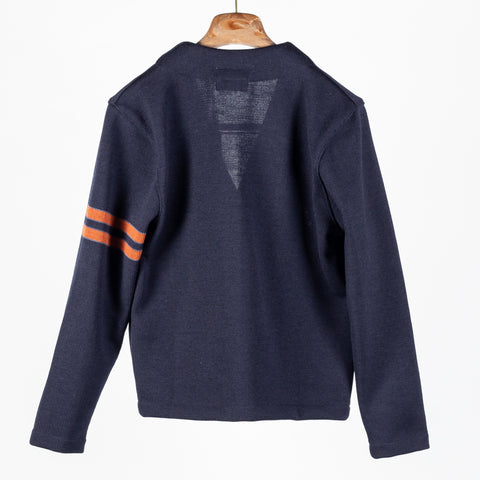 Dark navy wool Slouchy Varsity Cardigan with burnt orange sleeve stripes, back