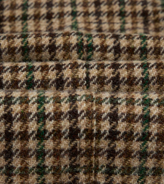 Close detail of the brown and green houndstooth wool used for Drake's Games Blazer, with its soft, slightly hairy surface.