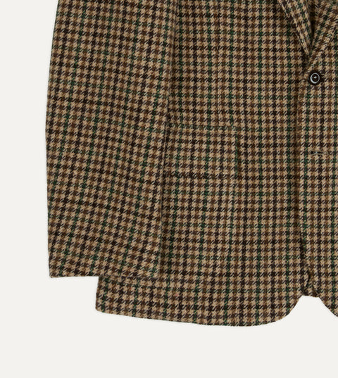 Slanted hip pocket, sleeve and hem of Drake's Brown and Green Houndstooth Tweed Games Blazer.