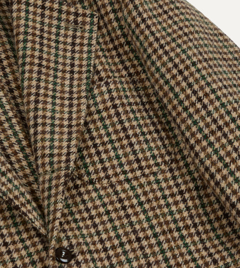 Front button and chest pocket of Drake's Brown and Green Houndstooth Tweed Games Blazer in close view.