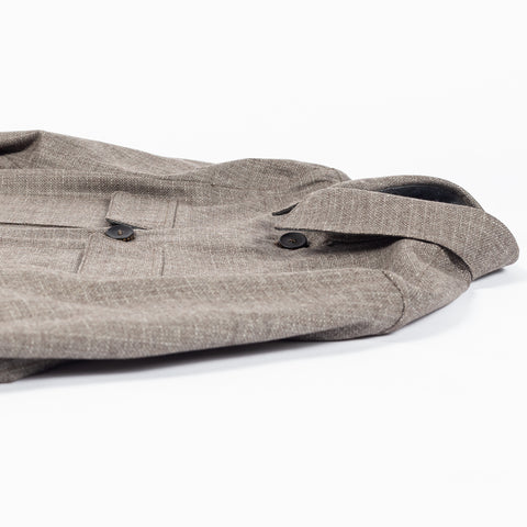 Fradi Yuta overshirt, folded flat showing pocket flaps and buttons