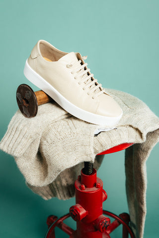 Fabiano Ricci Moon U1250 Grain Leather Sneaker resting on a lambswool cable knit
