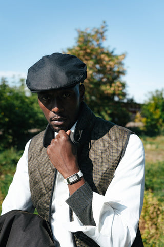 Waterville Olive Check Theo Quilted Vest layered under a waxed jacket