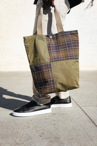 Barbour Dark Green Transport Patchwork Tote Bag carried at the side