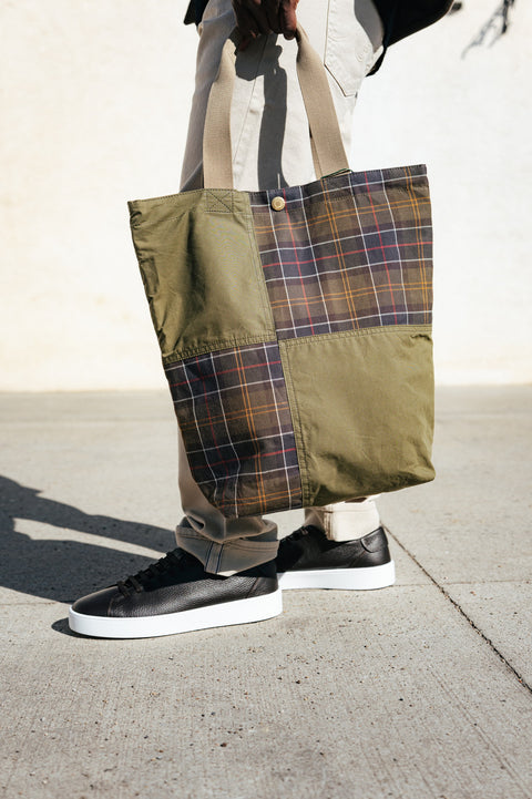 Barbour Dark Green Transport Patchwork Tote Bag carried at the side