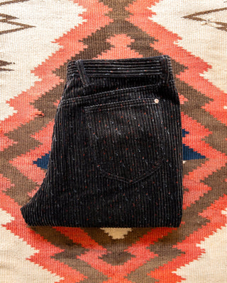 Folded Night Sky Donegal corduroy pants showing the back pocket