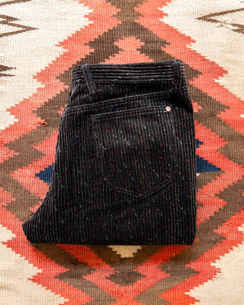 Folded Night Sky Donegal corduroy pants showing the back pocket
