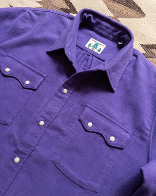 Collar, chest pockets and pearl snaps on the purple moleskin shirt