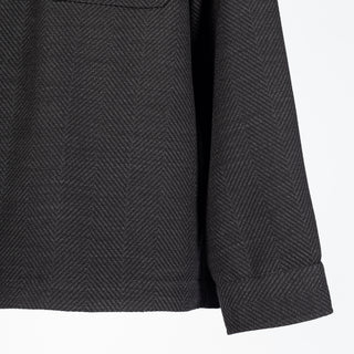 Xacus charcoal herringbone shacket, lower front and cuff detail