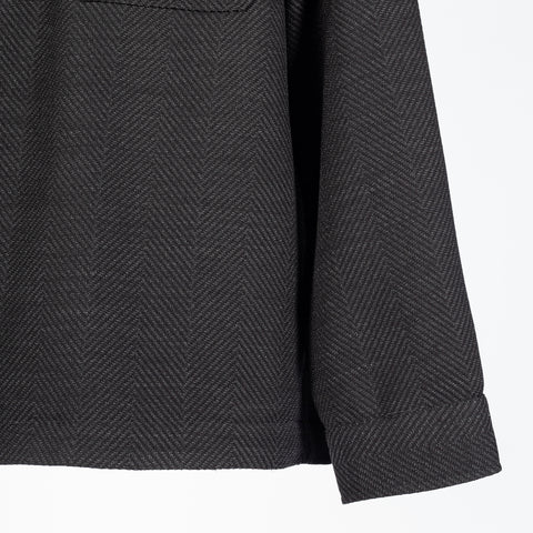 Xacus charcoal herringbone shacket, lower front and cuff detail