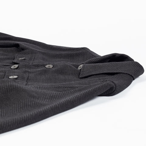 Xacus charcoal herringbone shacket, folded side view with placket buttons and cuff